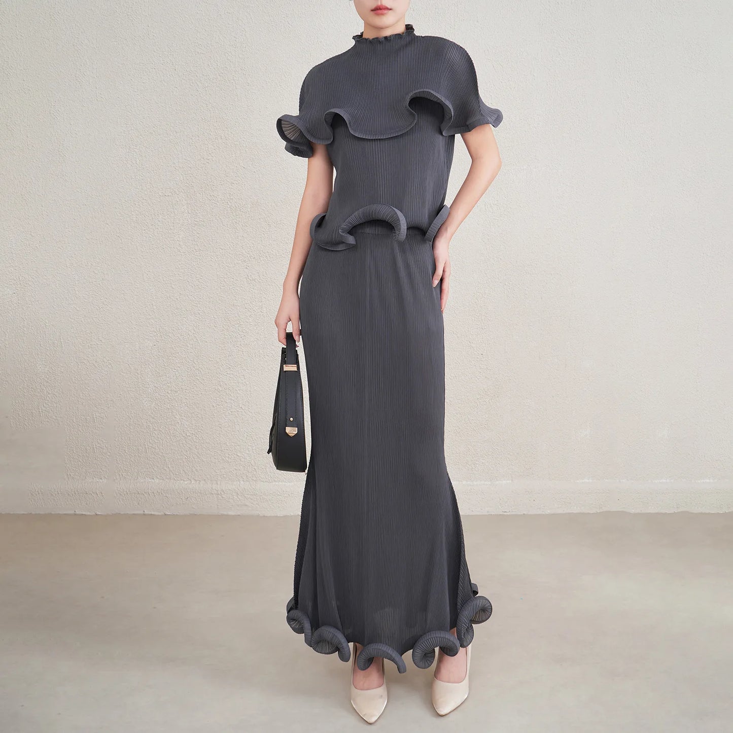 Conjunto plissado